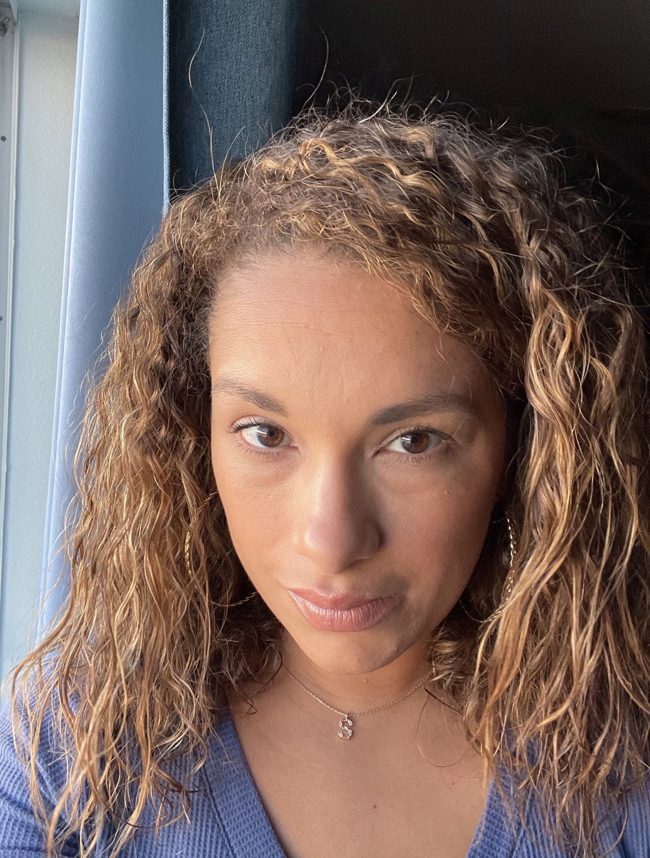 Shadaris at the beginning of her curl journey